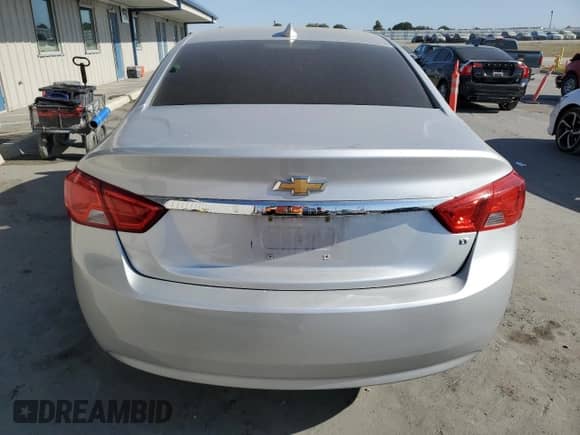 2017 Chevrolet Impala LT with VIN 2G1105SAXH9153244, listed as a Copart auction lot 68708565 with 164,700 mi miles and Salvage title. Bid and sale history available at DreamBid. Image 6.
