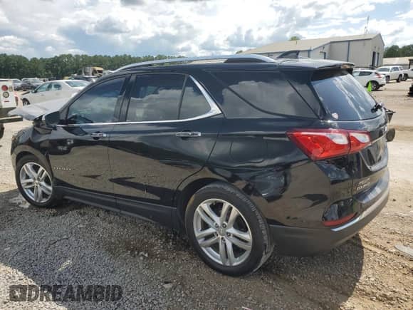 2019 Chevrolet Equinox Premier with VIN 3GNAXNEV9KL209297, listed as a Copart auction lot 64791585 with 105,810 mi miles and Salvage title. Bid and sale history available at DreamBid. Image 2.