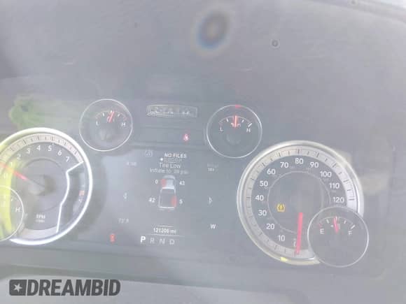 2018 Ram 1500 Laramie with VIN 1C6RR7NT2JS114085, listed as a IAAI auction lot 41794265 with 121,206 mi miles and . Bid and sale history available at DreamBid. Image 7.