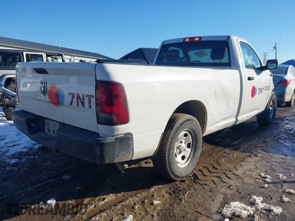 2018 Ram 1500 Tradesman with VIN 3C6JR6DG9JG140010, listed as a IAAI auction lot 41649801 with 182,613 mi miles and . Bid and sale history available at DreamBid. Image 4.