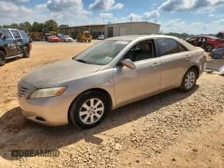 2007 Toyota Camry LE с VIN 4T1BK46K97U034827, выставлен на аукционе Copart как лот 84587115 с пробегом 155 000 миль миль и Чистый • Clean title. История ставок и продаж доступна на DreamBid. Изображение 1.