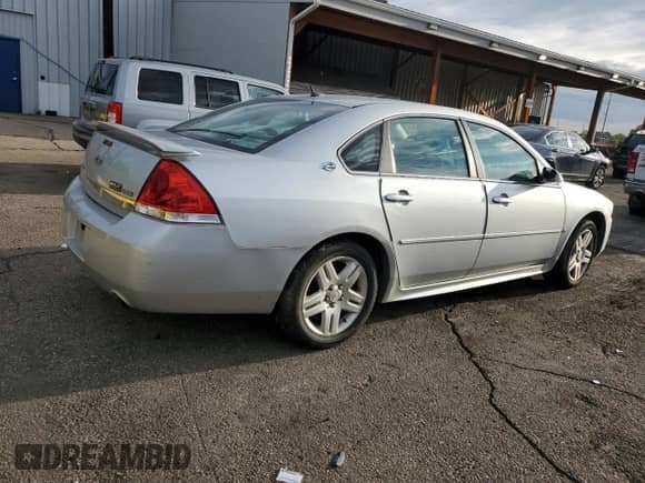 2009 Chevrolet Impala LT with VIN 2G1WC57M591321999, listed as a Copart auction lot 80885125 with 240,570 mi miles and Salvage title. Bid and sale history available at DreamBid. Image 3.