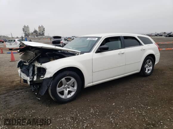 2007 Dodge Magnum with VIN 2D4FV47V57H623322, listed as a Copart auction lot 73356244 with 200,976 mi miles and Salvage title. Bid and sale history available at DreamBid. Image 1.