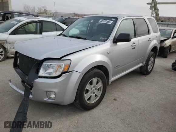 2008 Mercury Mariner with VIN 4M2CU91Z58KJ15755, listed as a Copart auction lot 50168565 with 130,883 mi miles and Salvage title. Bid and sale history available at DreamBid. Image 1.