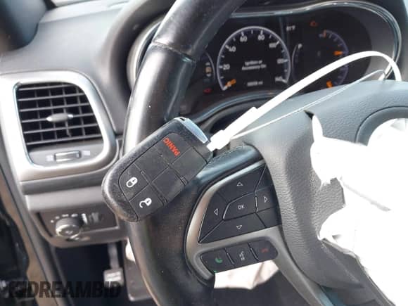 2020 Jeep Grand Cherokee Laredo E with VIN 1C4RJFAG0LC226447, listed as a IAAI auction lot 42598801 with 38,558 mi miles and . Bid and sale history available at DreamBid. Image 11.