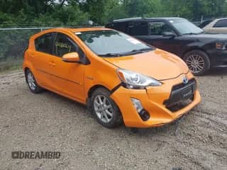 2015 Toyota Prius One z VIN JTDKDTB36F1108812, wystawiony jako IAAI lot #42464219 z przebiegiem 67 138 mil mil oraz . Historia ofert i sprzedaży dostępna na DreamBid. Obrazek 1.