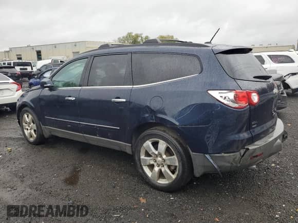 2011 Chevrolet Traverse LTZ z VIN 1GNKVLED0BJ135460, wystawiony jako Copart lot #80454835 z przebiegiem 180 583 mil mil oraz Czysty tytuł • Clean title. Historia ofert i sprzedaży dostępna na DreamBid. Obrazek 2.