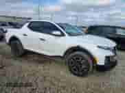 2024 Hyundai Santa Cruz SE с VIN 5NTJADDEXRH123885, выставлен на аукционе Copart как лот 86735314 с пробегом 8 012 миль миль и Списание • Salvage title. История ставок и продаж доступна на DreamBid. Изображение 4.