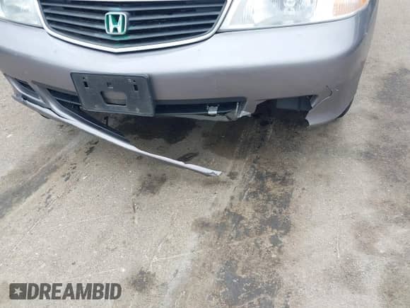 2000 Honda Odyssey LX z VIN 2HKRL1858YH593304, wystawiony jako IAAI lot #42755709 z przebiegiem 204 100 mil mil oraz . Historia ofert i sprzedaży dostępna na DreamBid. Obrazek 6.