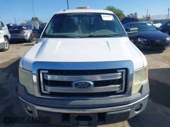 2014 Ford F-150 XL z VIN 1FTEX1CM7EKE91541, wystawiony jako IAAI lot #42625923 z przebiegiem 397 424 mil mil oraz . Historia ofert i sprzedaży dostępna na DreamBid. Obrazek 12.