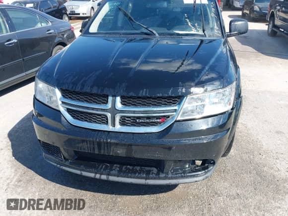 2017 Dodge Journey SE with VIN 3C4PDCAB9HT605136, listed as a IAAI auction lot 43423636 with 163,779 mi miles and . Bid and sale history available at DreamBid. Image 12.