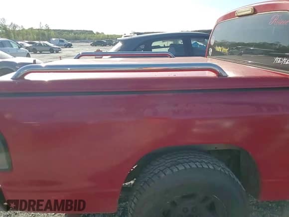 2001 Dodge Dakota Sport z VIN 1B7GL2AN21S108475, wystawiony jako Copart lot #52547305 z przebiegiem 218 025 mil mil oraz Szkoda całkowita • Salvage title. Historia ofert i sprzedaży dostępna na DreamBid. Obrazek 11.