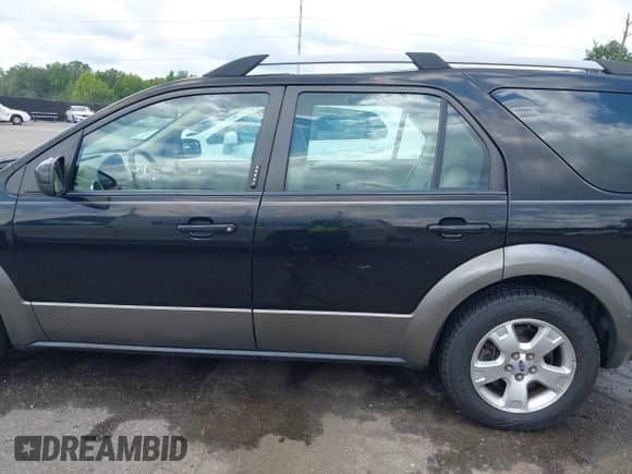 2007 Ford Freestyle SEL z VIN 1FMZK02187GA08822, wystawiony jako IAAI lot #42767525 z przebiegiem 100 771 mil mil oraz . Historia ofert i sprzedaży dostępna na DreamBid. Obrazek 14.