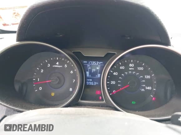 2012 Hyundai Veloster w/Gray Int z VIN KMHTC6AD1CU054540, wystawiony jako IAAI lot #43437087 z przebiegiem 173 534 mil mil oraz . Historia ofert i sprzedaży dostępna na DreamBid. Obrazek 7.