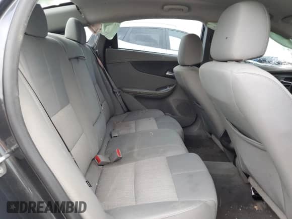2015 Chevrolet Impala LS z VIN 2G11X5SL7F9150134, wystawiony jako Copart lot #69204935 z przebiegiem 139 323 mil mil oraz Nie do naprawy • Non repairable. Historia ofert i sprzedaży dostępna na DreamBid. Obrazek 10.