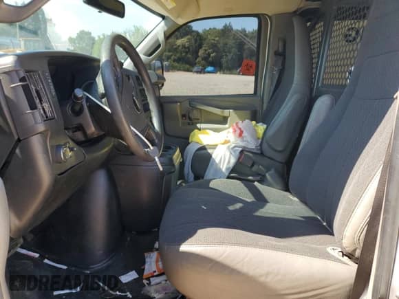 2019 Chevrolet Express Cargo with VIN 1GCWGAFG9K1263827, listed as a Copart auction lot 61273885 with 216,073 mi miles and Salvage title. Bid and sale history available at DreamBid. Image 7.