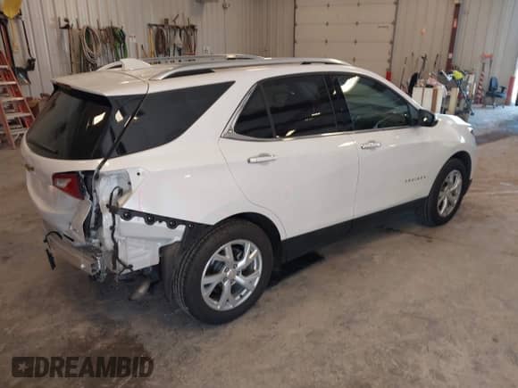 2021 Chevrolet Equinox Premier z VIN 3GNAXXEV0MS119024, wystawiony jako IAAI lot #42550302 z przebiegiem 41 544 mil mil oraz . Historia ofert i sprzedaży dostępna na DreamBid. Obrazek 4.