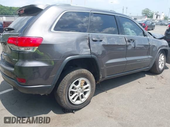 2020 Jeep Grand Cherokee Laredo E with VIN 1C4RJFAG9LC419986, listed as a IAAI auction lot 42610904 with 61,077 mi miles and . Bid and sale history available at DreamBid. Image 4.