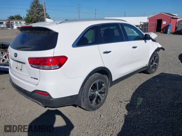 2016 Kia Sorento EX z VIN 5XYPHDA16GG034423, wystawiony jako IAAI lot #42386205 z przebiegiem 86 710 mil mil oraz . Historia ofert i sprzedaży dostępna na DreamBid. Obrazek 4.