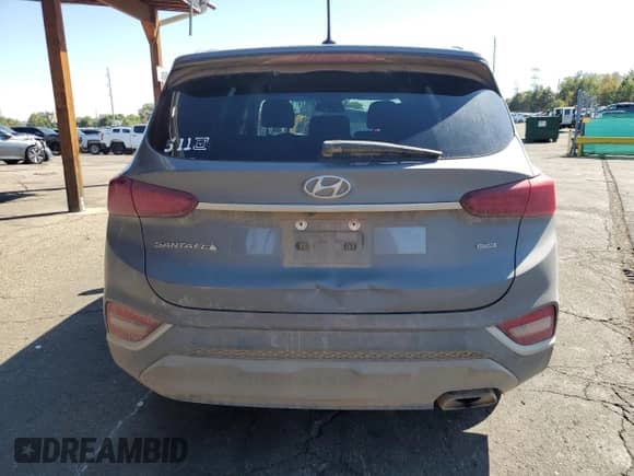 2019 Hyundai Santa Fe SE z VIN 5NMS2CAD4KH108243, wystawiony jako Copart lot #81579355 z przebiegiem 148 089 mil mil oraz Nie do naprawy • Non repairable. Historia ofert i sprzedaży dostępna na DreamBid. Obrazek 6.