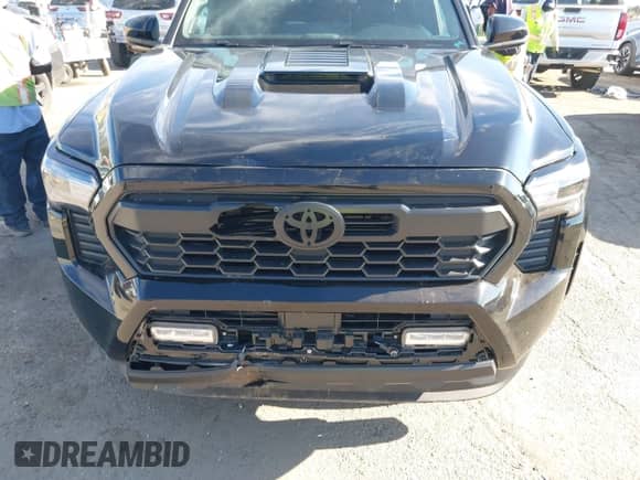 2024 Toyota Tacoma SR5 with VIN 3TMKB5FN3RM000779, listed as a IAAI auction lot 43081279 with 24,906 mi miles and . Bid and sale history available at DreamBid. Image 6.