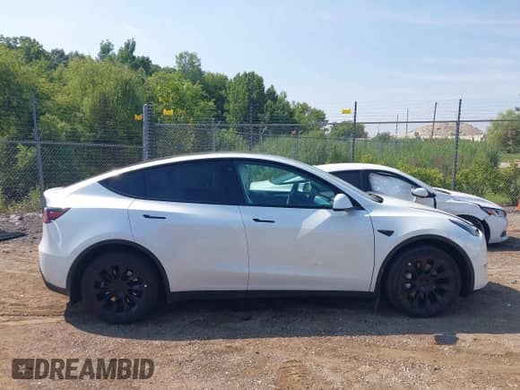 2023 Tesla Model Y Long Range с VIN 7SAYGAEE5PF708297, выставлен на аукционе IAAI как лот 42927362 с пробегом 27 230 миль миль и . История ставок и продаж доступна на DreamBid. Изображение 12.