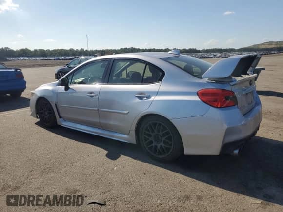 2015 Subaru WRX Premium with VIN JF1VA1D69F8815532, listed as a Copart auction lot 62452325 with 184,857 mi miles and Salvage title. Bid and sale history available at DreamBid. Image 2.