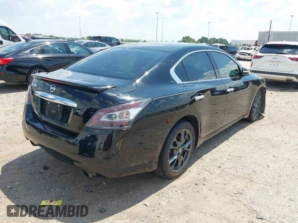 2014 Nissan Maxima S z VIN 1N4AA5AP4EC498516, wystawiony jako IAAI lot #43125499 z przebiegiem 159 797 mil mil oraz . Historia ofert i sprzedaży dostępna na DreamBid. Obrazek 4.