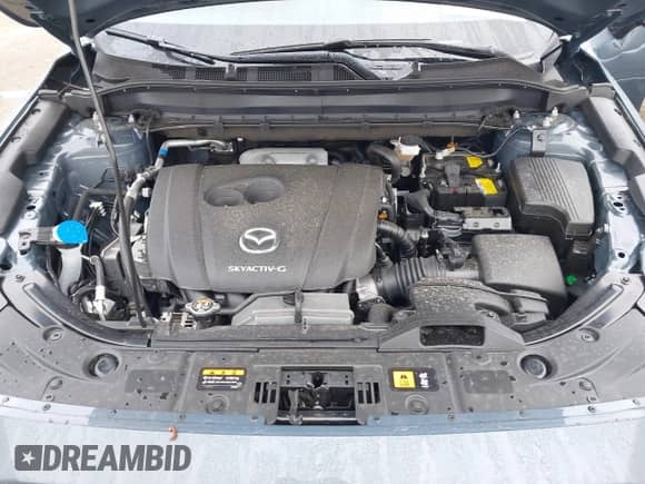 2024 Mazda CX-5 S Preferred z VIN JM3KFBCL4R0517217, wystawiony jako IAAI lot #42643323 z przebiegiem 7 072 mil mil oraz . Historia ofert i sprzedaży dostępna na DreamBid. Obrazek 10.