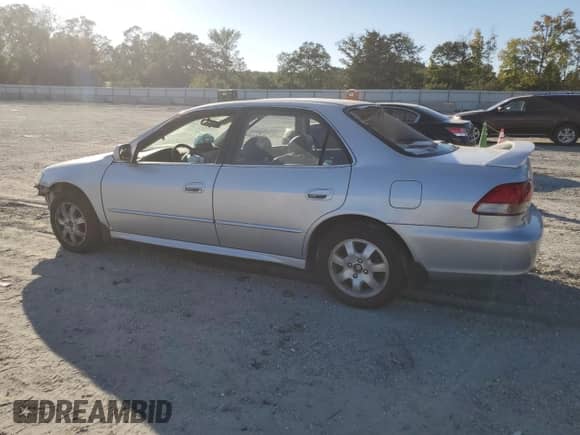 2002 Honda Accord EX with VIN 1HGCG56692A159891, listed as a Copart auction lot 82185555 with 256,443 mi miles and Salvage title. Bid and sale history available at DreamBid. Image 2.