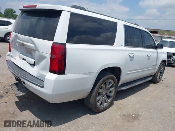 2016 Chevrolet Suburban LTZ with VIN 1GNSKJKC4GR215460, listed as a IAAI auction lot 42333991 with 183,700 mi miles and . Bid and sale history available at DreamBid. Image 4.