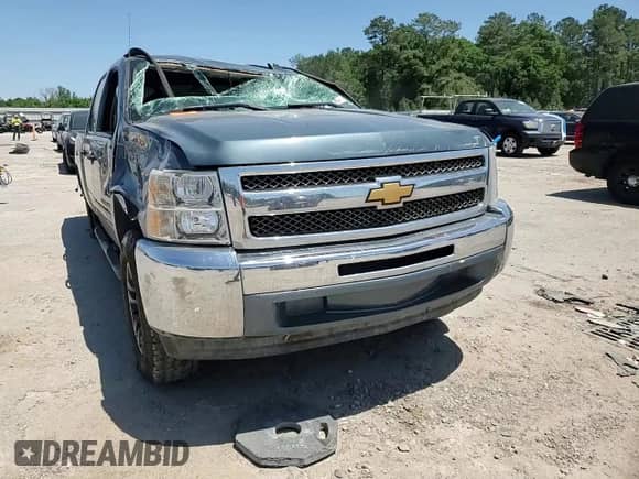 2012 Chevrolet Silverado 1500 LS z VIN 3GCPCREA8CG221292, wystawiony jako Copart lot #54921445 z przebiegiem Nie podano mil oraz Szkoda całkowita • Salvage title. Historia ofert i sprzedaży dostępna na DreamBid. Obrazek 13.