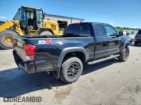 2022 Toyota Tacoma SR z VIN 3TYSZ5AN0NT082424, wystawiony jako Copart lot #65411225 z przebiegiem 22 506 mil mil oraz Szkoda całkowita • Salvage title. Historia ofert i sprzedaży dostępna na DreamBid. Obrazek 3.