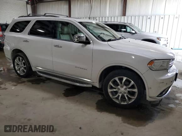 2018 Dodge Durango Citadel Anodized Platinum with VIN 1C4SDJET4JC101127, listed as a Copart auction lot 62551585 with 143,357 mi miles and Salvage title. Bid and sale history available at DreamBid. Image 4.