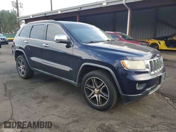 2012 Jeep Grand Cherokee Overland with VIN 1C4RJECG7CC177190, listed as a Copart auction lot 64283025 with 171,511 mi miles and Salvage title. Bid and sale history available at DreamBid. Image 4.