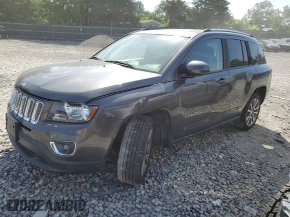 2017 Jeep Compass Latitude with VIN 1C4NJCEA3HD117971, listed as a Copart auction lot 60521815 with 73,376 mi miles and Salvage title. Bid and sale history available at DreamBid. Image 1.