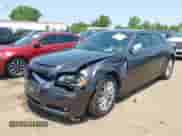 2013 Chrysler 300 C with VIN 2C3CCAKT6DH744998, listed as a IAAI auction lot 42394657 with 142,837 mi miles and . Bid and sale history available at DreamBid. Image 6.