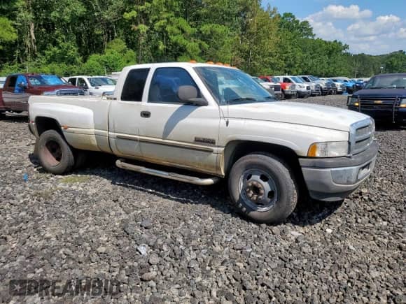 2002 Dodge 3500 с VIN 3B7MC33672M294250, выставлен на аукционе Copart как лот 65146125 с пробегом 395 110 миль миль и Списание • Salvage title. История ставок и продаж доступна на DreamBid. Изображение 4.