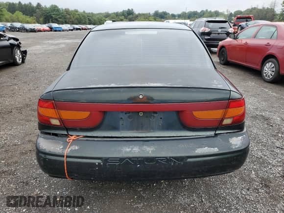 2001 Saturn SL with VIN 1G8ZK52741Z352630, listed as a Copart auction lot 80522265 with Not provided miles and Salvage title. Bid and sale history available at DreamBid. Image 6.
