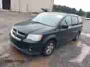 2011 Dodge Grand Caravan Crew with VIN 2D4RN5DG1BR706998, listed as a IAAI auction lot 43323311 with 198,117 mi miles and . Bid and sale history available at DreamBid. Image 2.