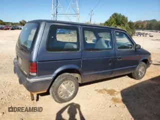 1992 Dodge Caravan with VIN 2B4GH2535NR705117, listed as a Copart auction lot 77091264 with 174,008 mi miles and Salvage title. Bid and sale history available at DreamBid. Image 3.