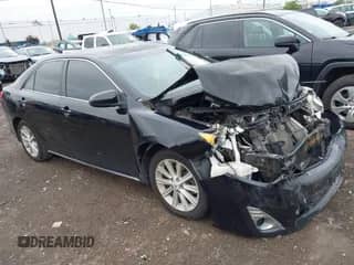 2012 Toyota Camry SE with VIN 4T1BK1FK3CU001265, listed as a IAAI auction lot 43032863 with 170,069 mi miles and . Bid and sale history available at DreamBid. Image 1.