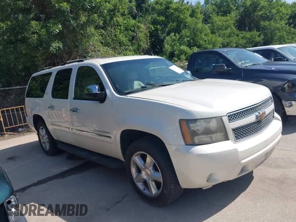 2011 Chevrolet Suburban LTZ с VIN 1GNSCKE09BR201504, выставлен на аукционе IAAI как лот 42703687 с пробегом 223 838 миль миль и . История ставок и продаж доступна на DreamBid. Изображение 13.