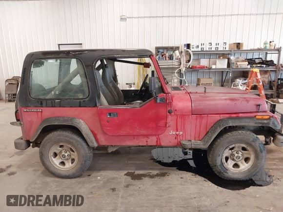 1991 Jeep Wrangler with VIN 2J4FY19P7MJ105423, listed as a IAAI auction lot 42276287 with 128,281 mi miles and . Bid and sale history available at DreamBid. Image 13.