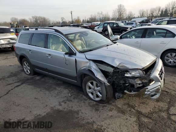2012 Volvo XC70 3.2L with VIN YV4940BZ8C1122513, listed as a Copart auction lot 84524664 with 123,558 mi miles and Salvage title. Bid and sale history available at DreamBid. Image 4.