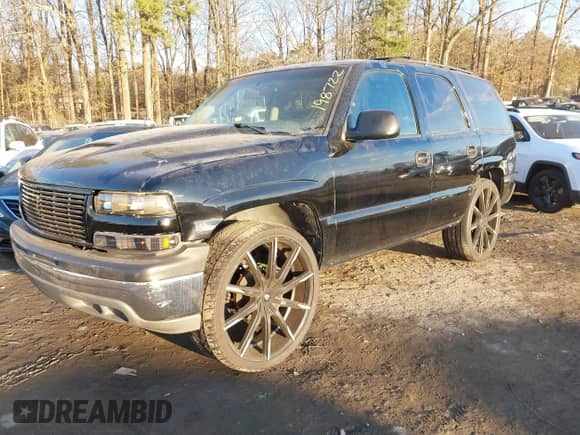 2001 Chevrolet Tahoe LS with VIN 1GNEC13T01J198722, listed as a IAAI auction lot 41385593 with Not provided miles and . Bid and sale history available at DreamBid. Image 2.