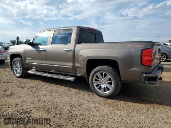 2014 Chevrolet Silverado 1500 High Country с VIN 3GCUKTEJ0EG558030, выставлен на аукционе Copart как лот 69486575 с пробегом 128 492 миль миль и Чистый • Clean title. История ставок и продаж доступна на DreamBid. Изображение 2.