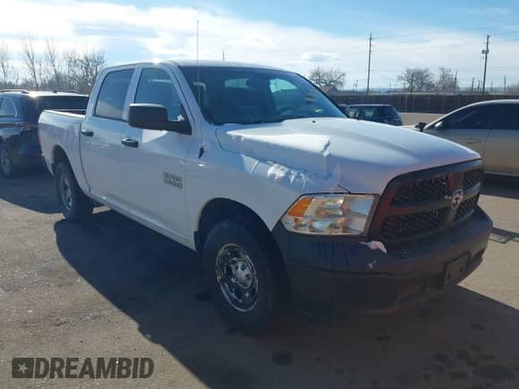 2015 Ram 1500 Tradesman with VIN 1C6RR7KG5FS660748, listed as a IAAI auction lot 41403779 with 201,127 mi miles and . Bid and sale history available at DreamBid. Image 1.