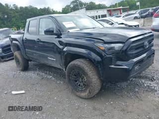 2024 Toyota Tacoma SR5 with VIN 3TMLB5JN3RM049802, listed as a IAAI auction lot 42448898 with 9,049 mi miles and . Bid and sale history available at DreamBid. Image 1.