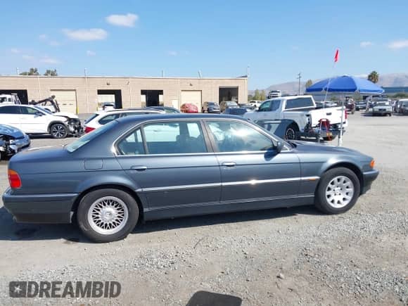 2000 BMW 7 Series 740iL with VIN WBAGH8347YDP09756, listed as a IAAI auction lot 43401435 with 239,436 mi miles and . Bid and sale history available at DreamBid. Image 13.